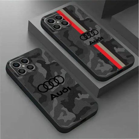 a pair of black camouflage iphone cases with red and white stripes