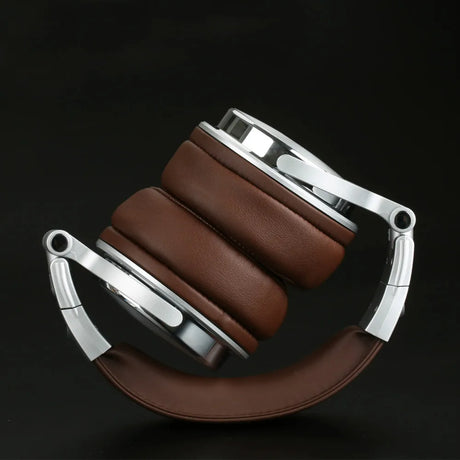 Pair of brown and silver over-ear headphones with a folded design.