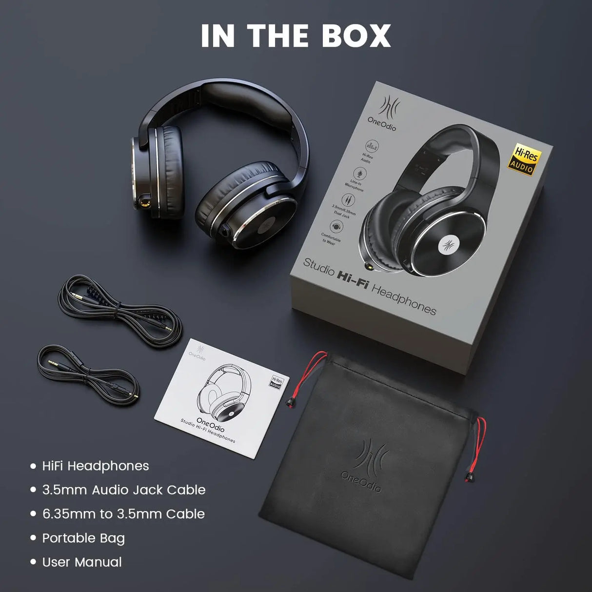 Pair of over-ear wireless headphones with their packaging and accessories.