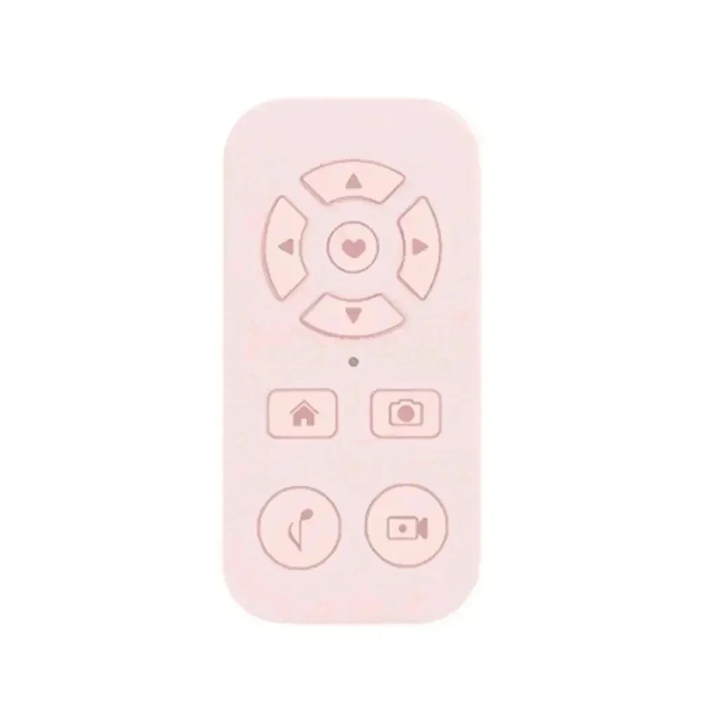 Pale pink remote control with heart-centered directional pad and function buttons.