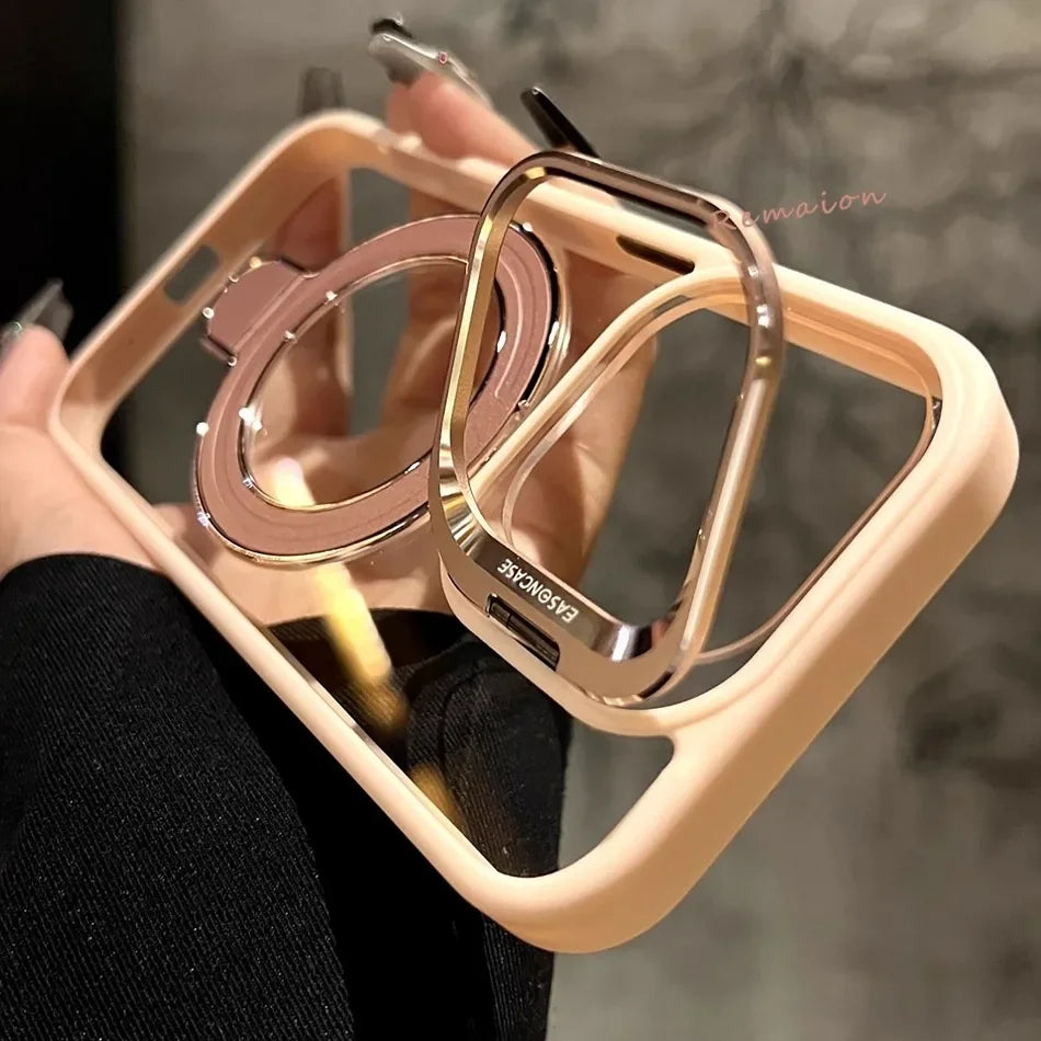 Peach-colored phone case with rotating metal stand.