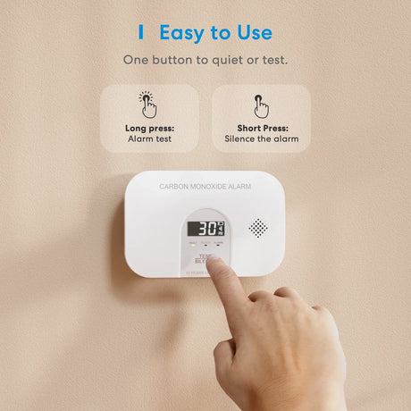 a person pressing the button on a smart therm