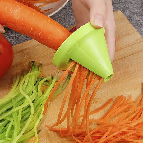 a person cutting carrots on a cutting board