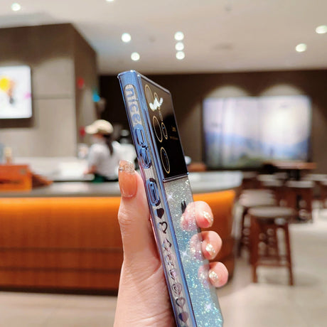a person holding a cell phone in their hand
