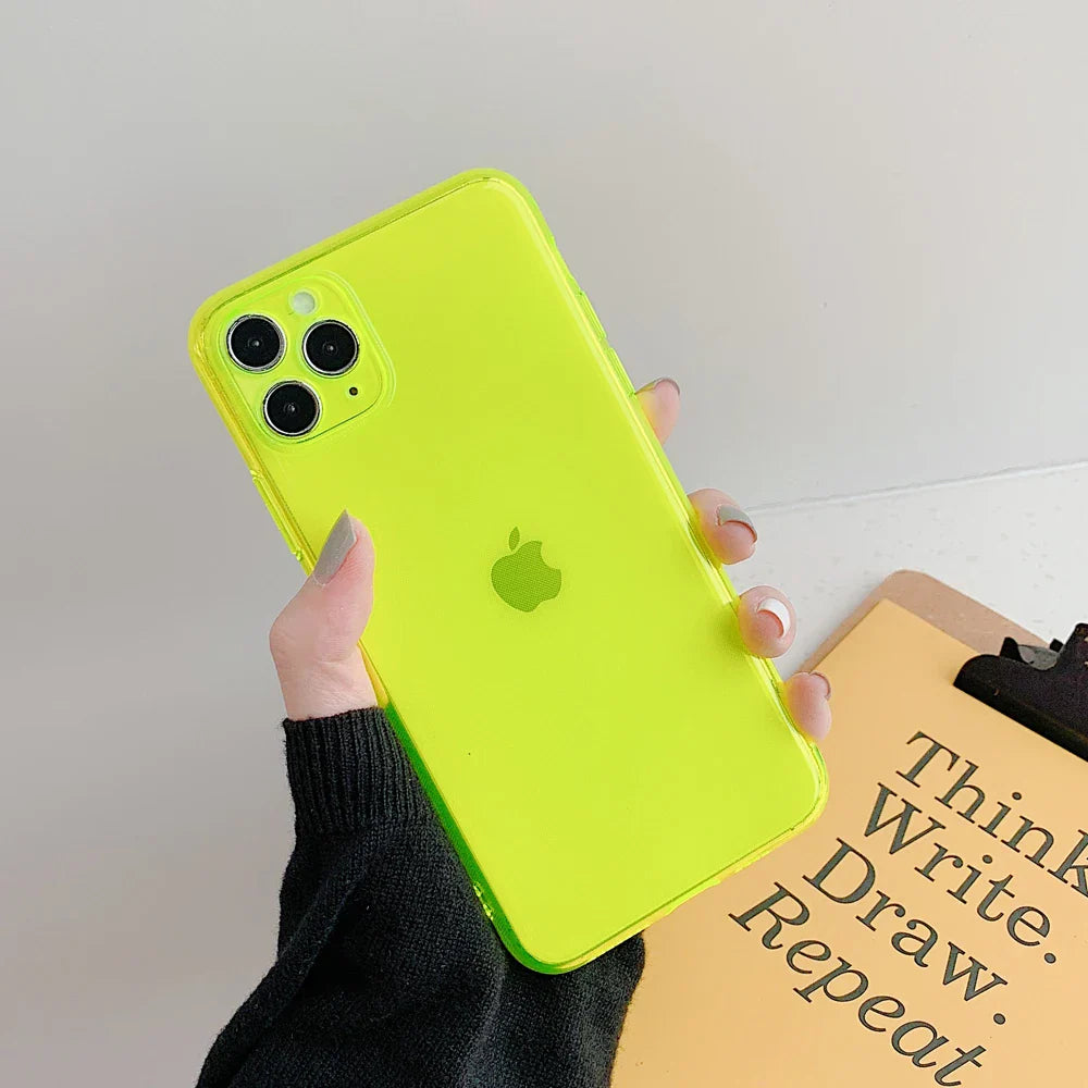 a person holding a green iphone case