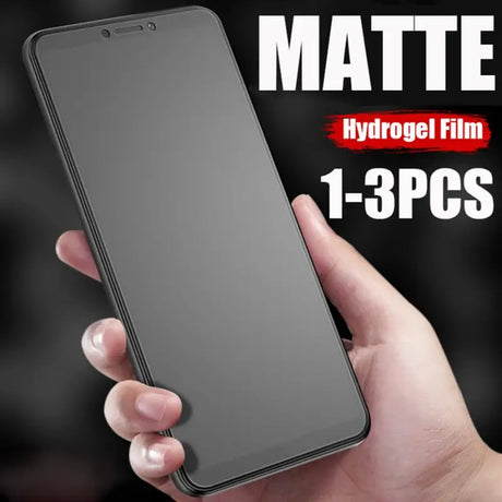 a person holding a black phone with a black screen and a red text that reads matt