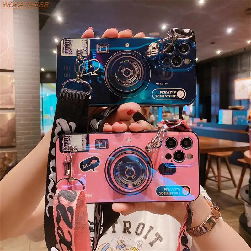 a person holding up a camera in their hands