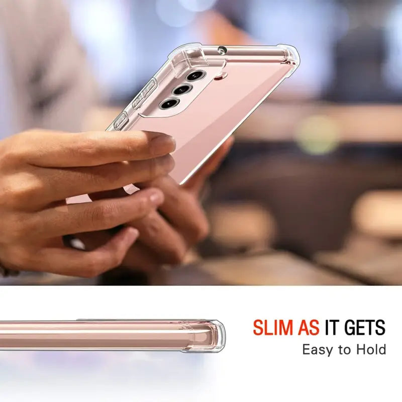 a person holding a cell phone in their hand