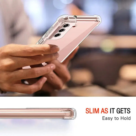 a person holding a cell phone in their hand
