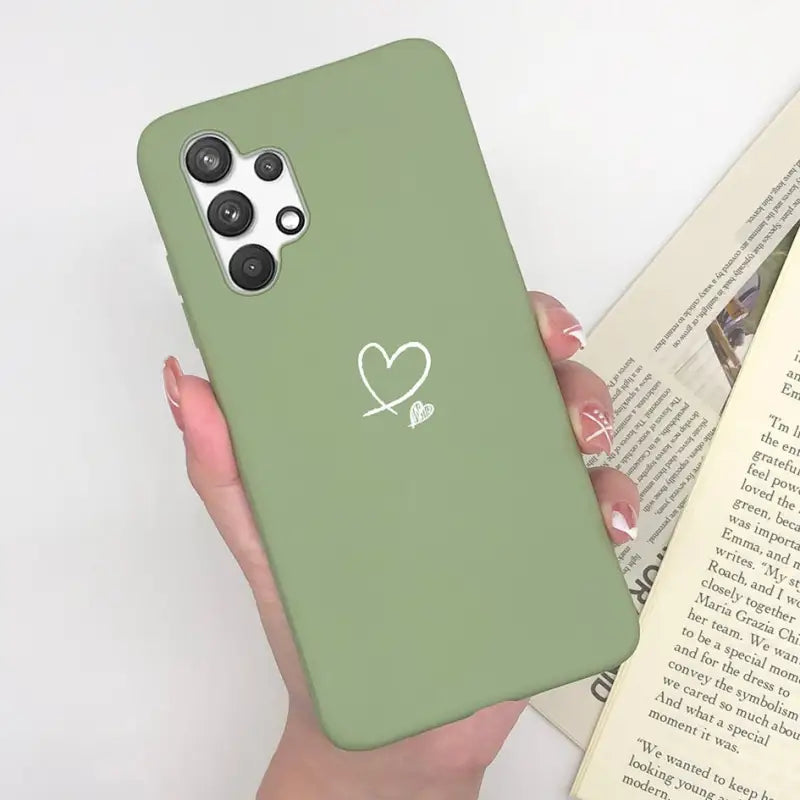 a person holding a green phone case