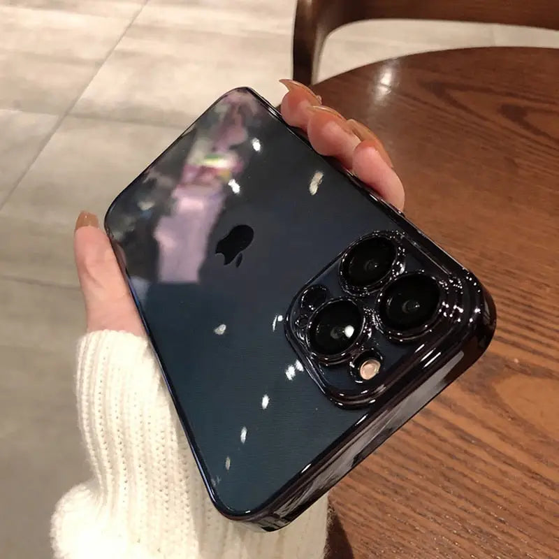 a person holding an iphone in their hand