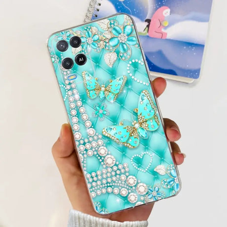 a woman holding a phone case with a diamond and pearl design