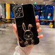 a person holding a phone with a rabbit on it