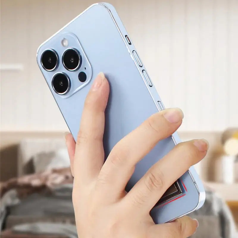 a person holding a phone with a camera