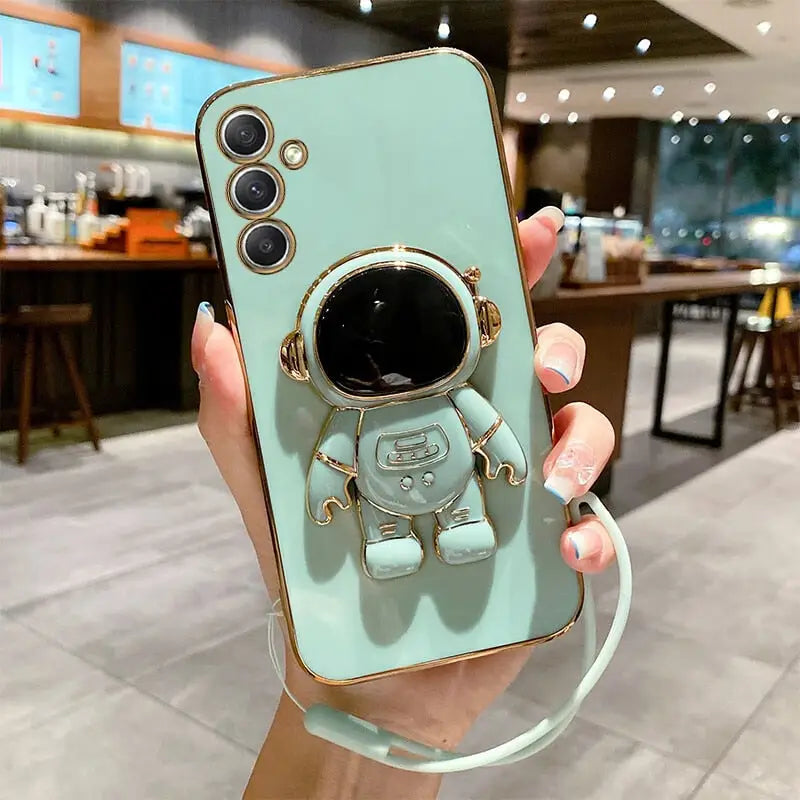 a person holding a phone case with a camera