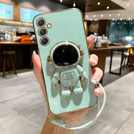 a person holding a phone case with a camera