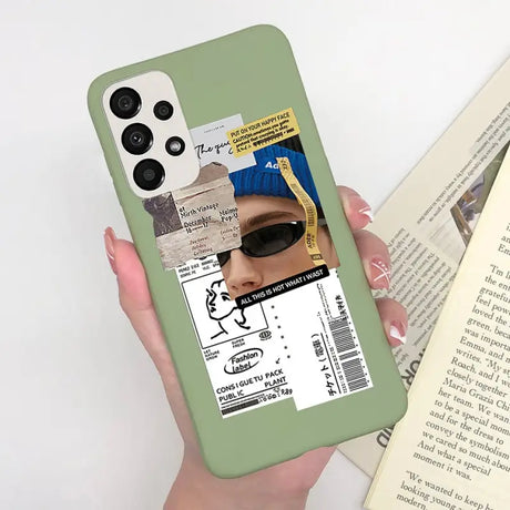 a person holding a book and a phone case