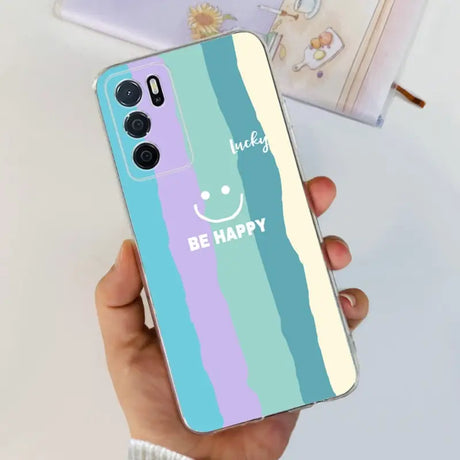 a person holding a phone case with the words be happy