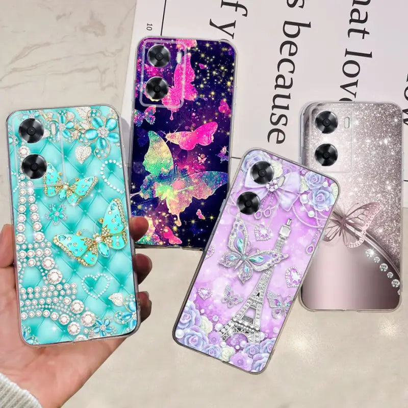 a hand holding a phone case with a variety of different designs