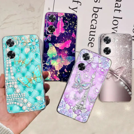 a hand holding a phone case with a variety of different designs