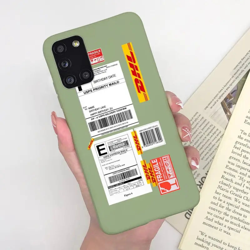 a person holding a book and a phone case