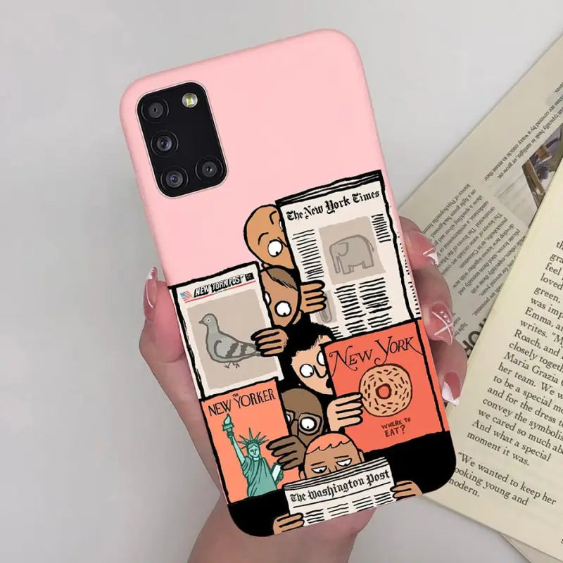 a person holding a phone case with a cartoon character