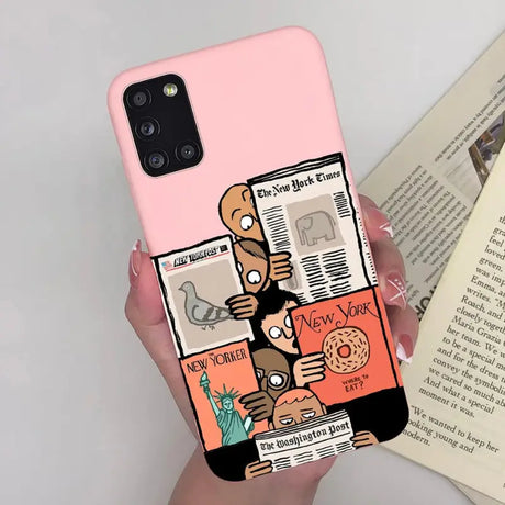 a person holding a phone case with a cartoon character