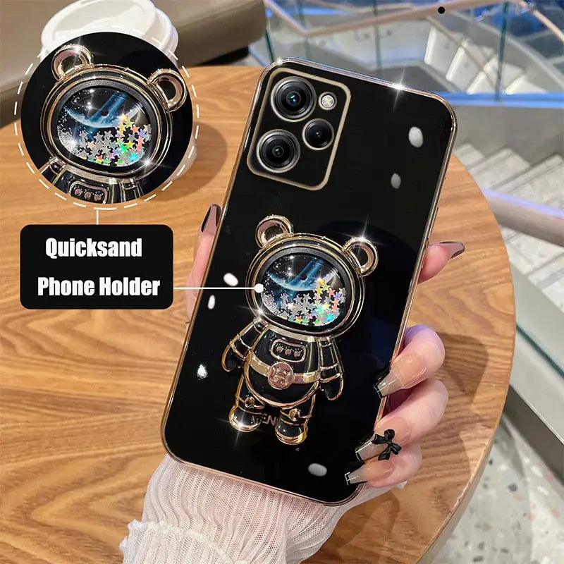 a person holding a phone case with a watch on it