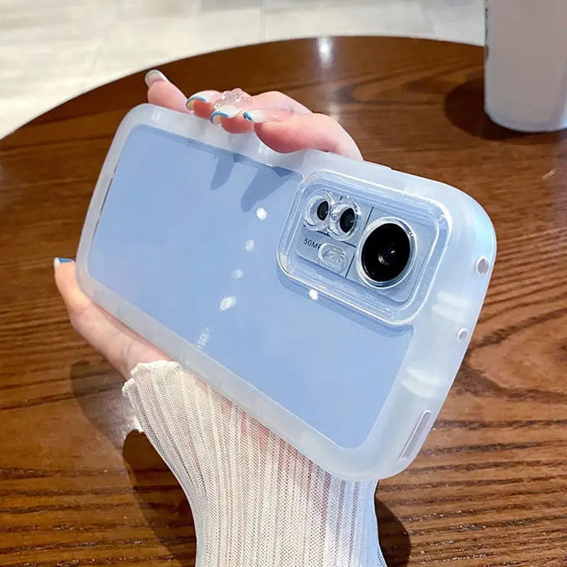 a person holding a phone case with a camera
