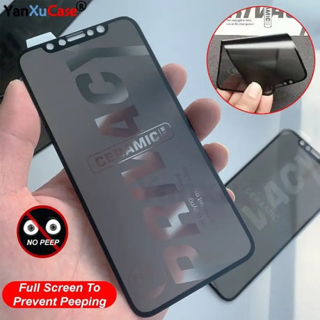 a hand holding a phone case with a screen