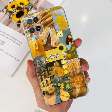 a person holding a phone with a yellow flower