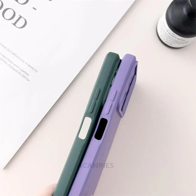 a person holding a purple phone case