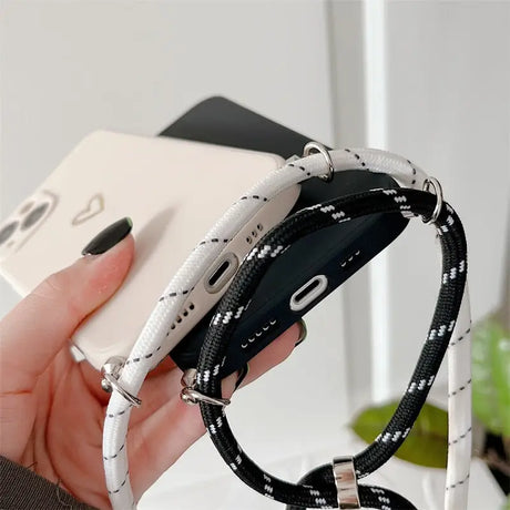a person holding a smart watch in their hand