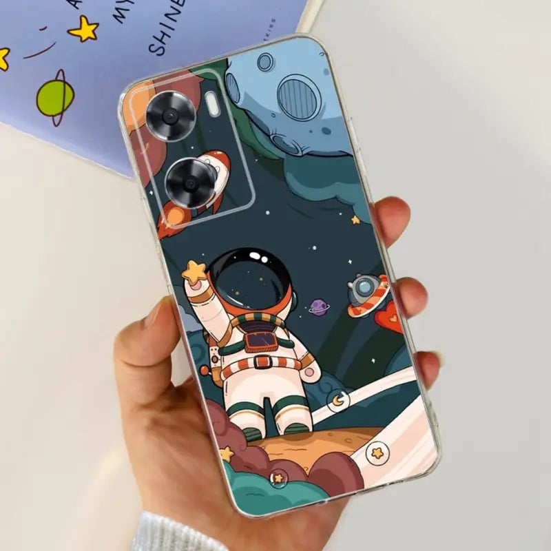 a person holding a phone case with a cartoon character