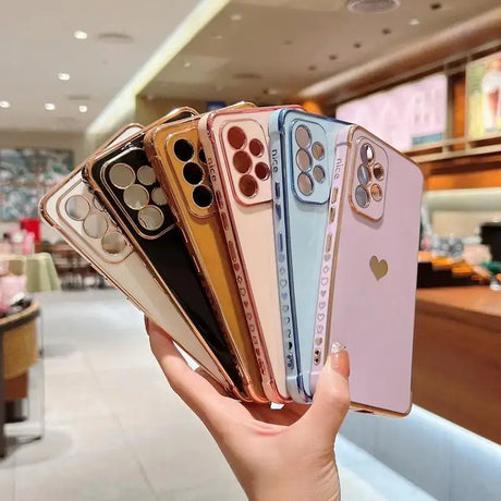 A person holding up a phone case