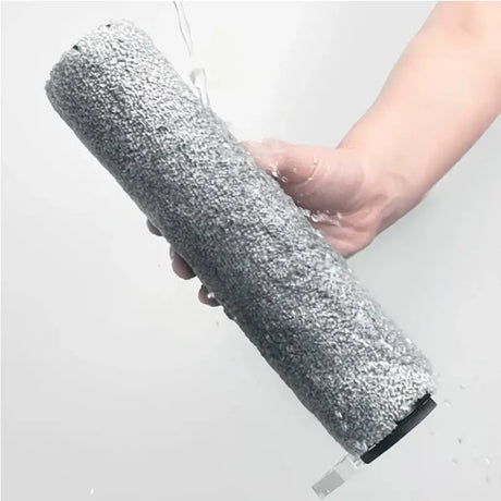 a person holding a roll of felt with a hand