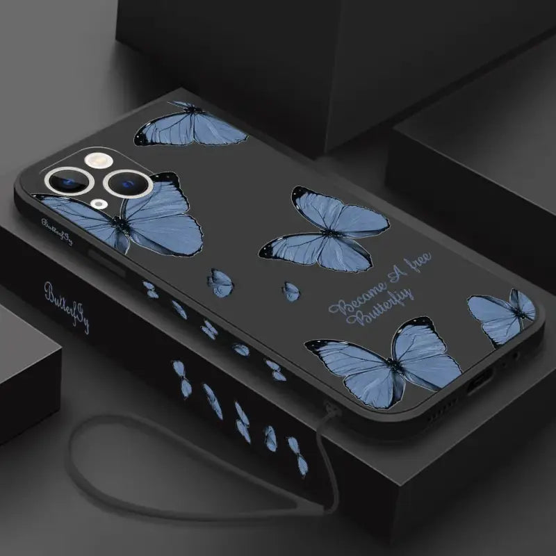 A phone case with blue butterflies on it