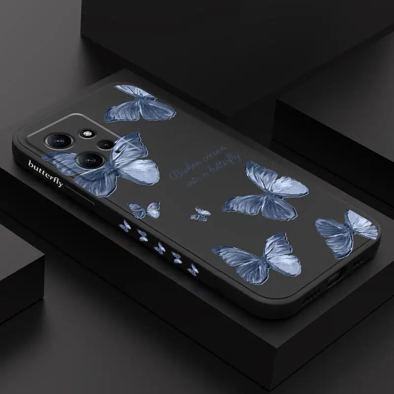 the back of a black iphone case with blue flowers