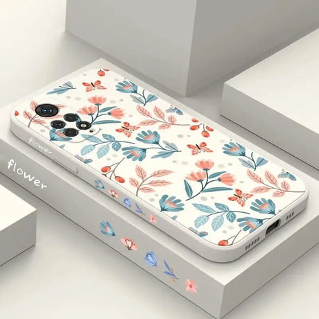 A phone case with a floral pattern on it