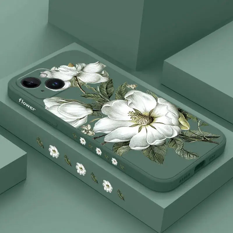 A phone case with white flowers on it