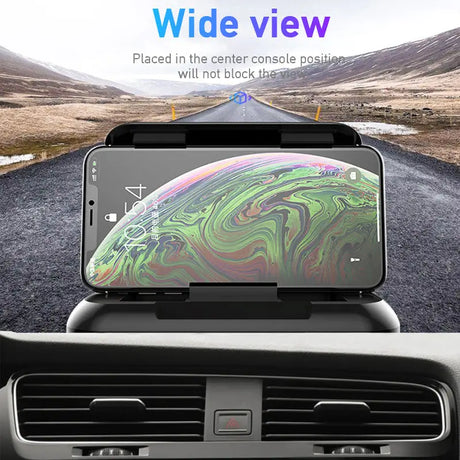 the car phone holder is attached to the dashboard