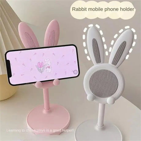 a phone holder with a rabbit on it