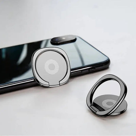 a phone with a ring on top of it