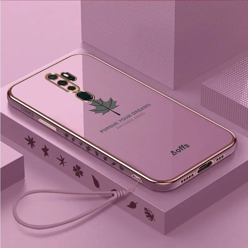 a pink case with a gold phone on top