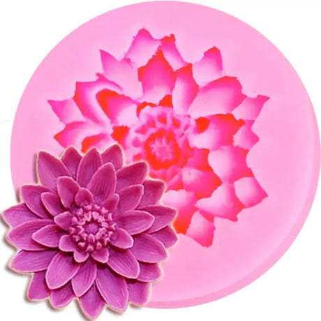 a pink flower on a pink plate