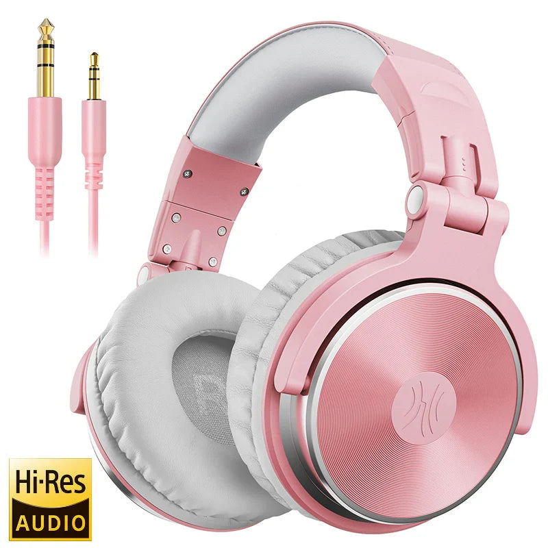 Pink over-ear headphones with white ear cushions and gold-plated audio connectors.