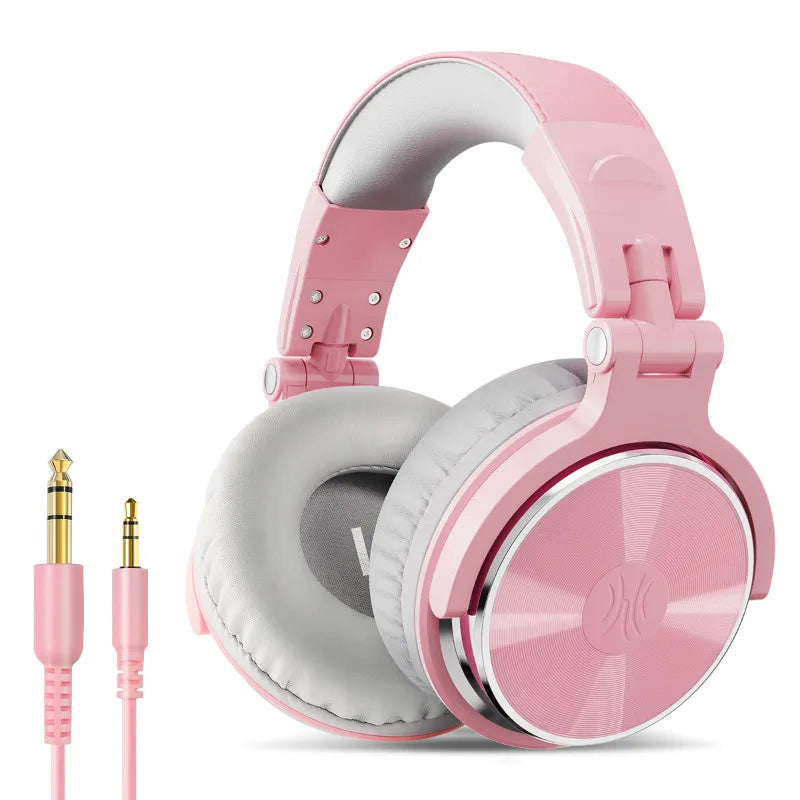 Pink over-ear headphones with white ear cushions and a detachable audio cable.