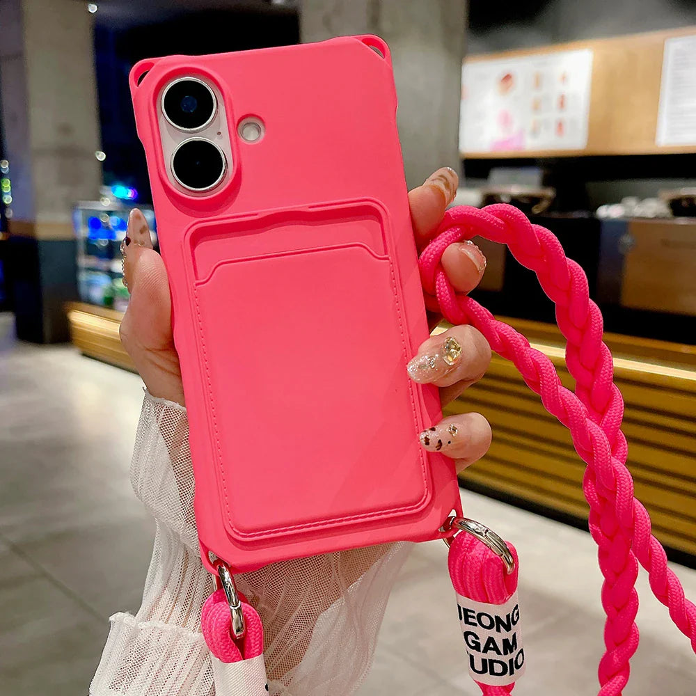 Pink phone case with card holder and lanyard.