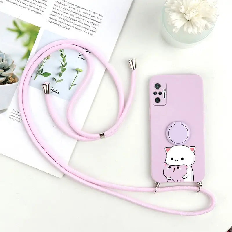 a pink phone case with a cat on it