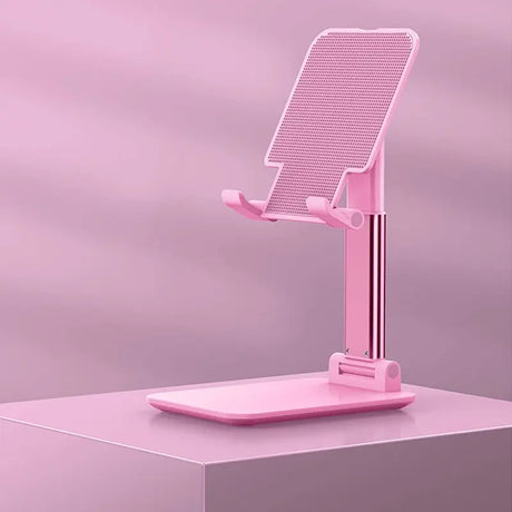 a pink microphone stand on a pink background